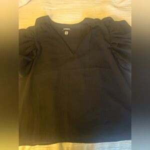 XL Express Gently used black puff sleeve blouse.